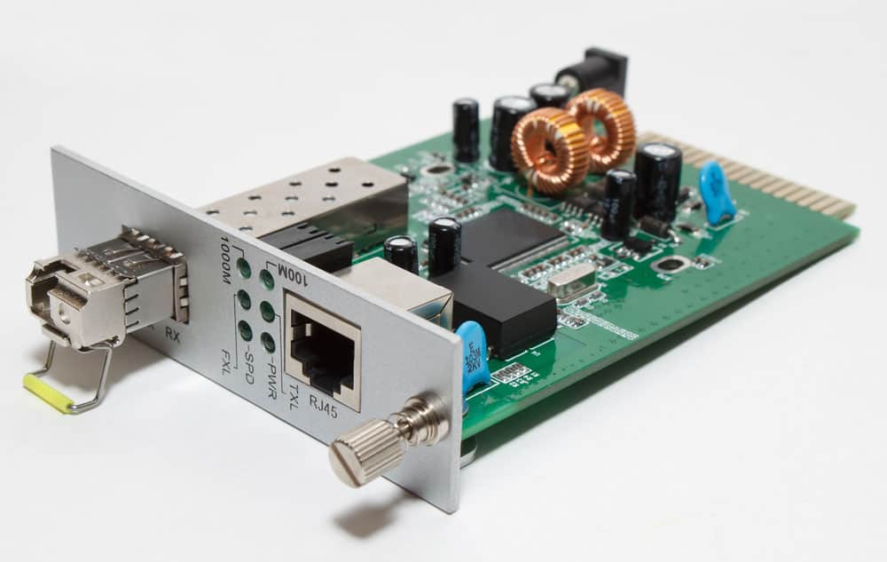 Fiber optic media converter card with SFP