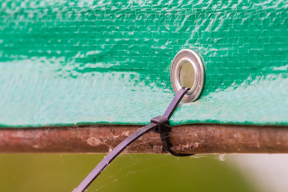 A zip tie fixing on the banner