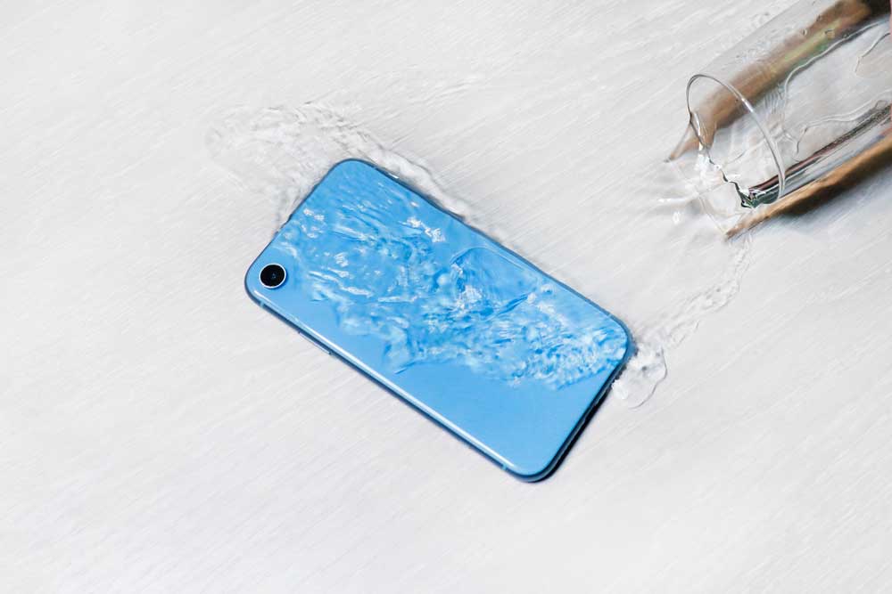 Water poured on a phone.