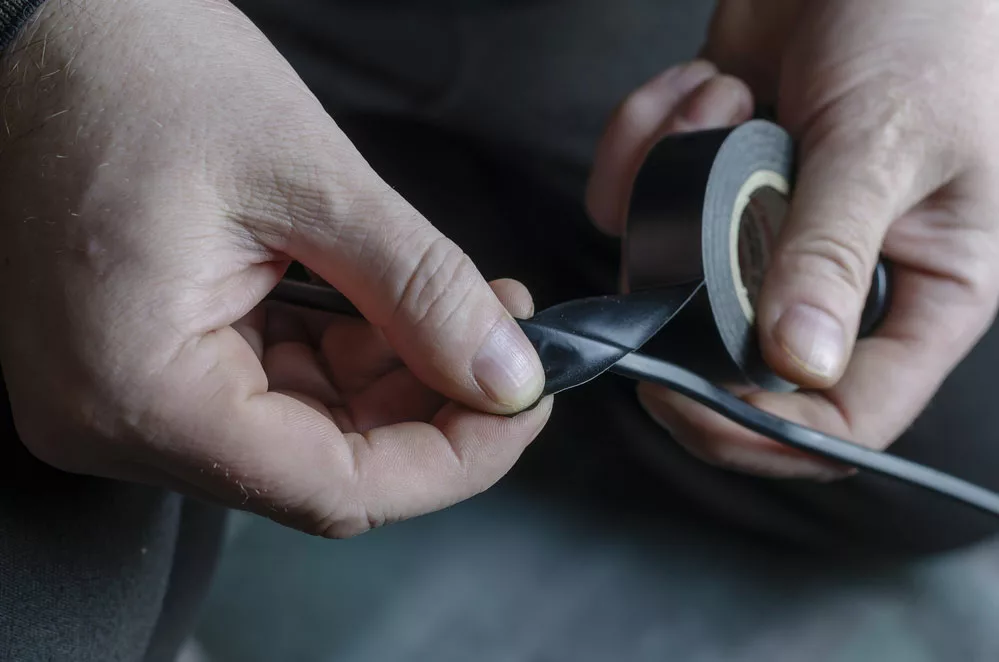 Insulating a wire using an electrical tape