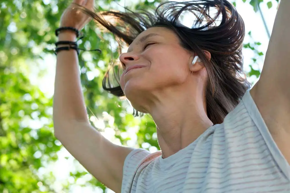 Woman using IEMs