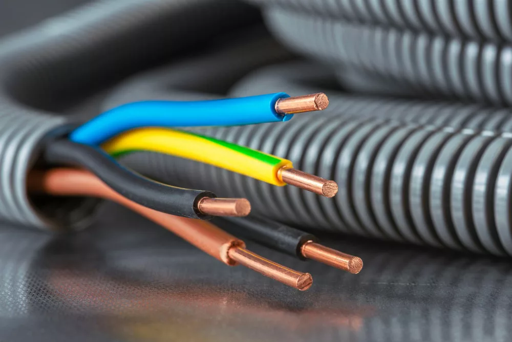 Electric wire conduit in a pipe.