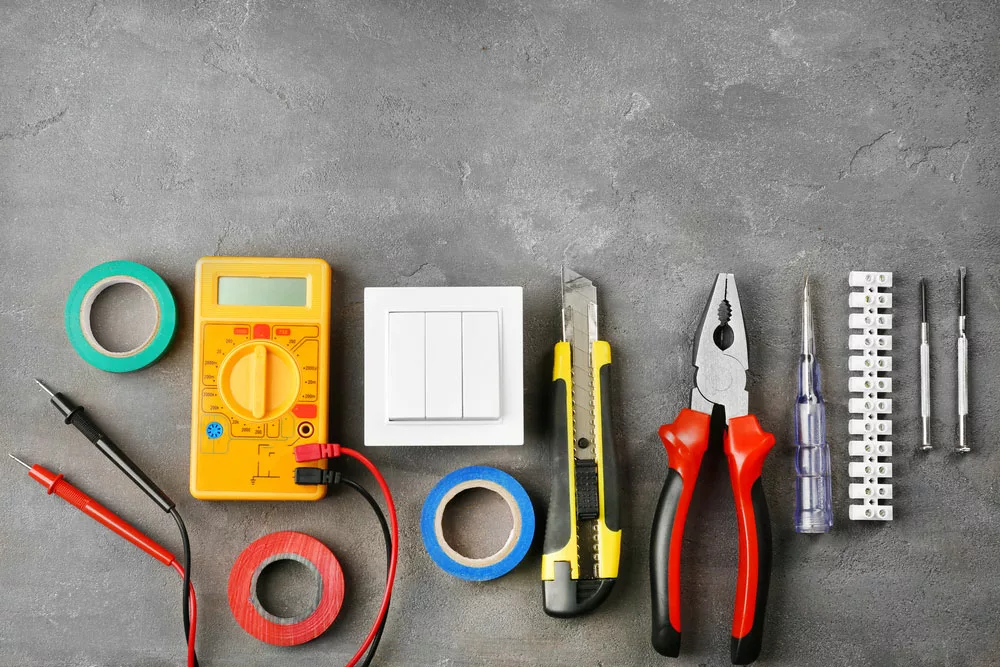 A wire cutting knife, among other electrician’s tools