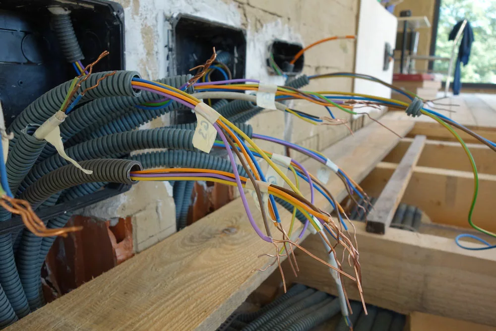 Copper and Aluminum wires are connected to a distribution board.