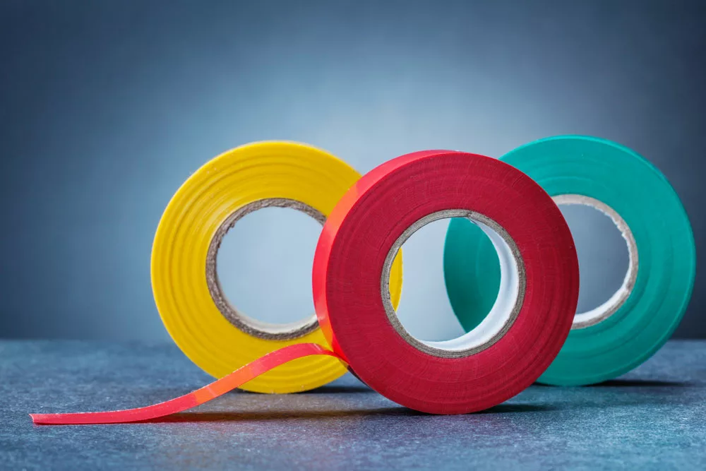 Three colored electrical tape rolls