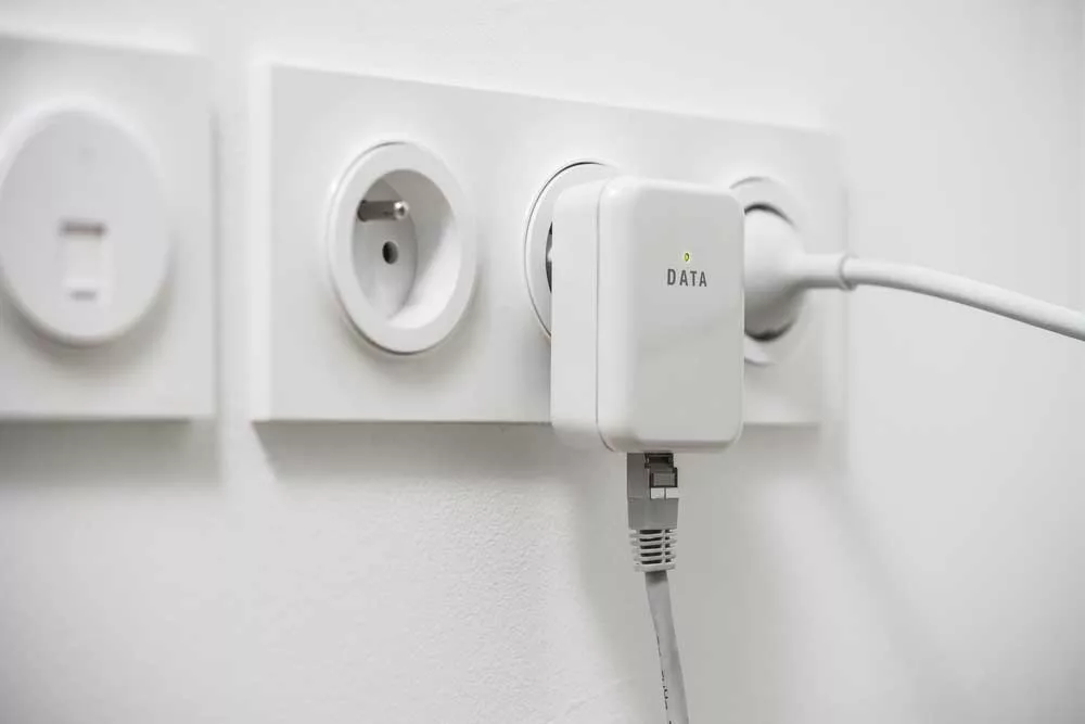 Powerline adapters plugged into the wall