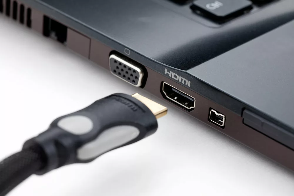 HDMI cable plugged into a laptop